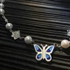 Nieuwe Rose Blue Butterfly Pearl Necklace Trend Hip Hop Mannen en Vrouwen Short Wild Sweater Chain Paar Ins