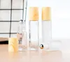 Frosted Clear Glass Roller Flessen Fials Containers met metalen rolbal en houtnerf plastic dop voor essentiële olie parfum snel schip