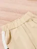 Pantaloni sportivi in felpa con cucitura laterale a contrasto con grafica Baby Letter e maniche raglan SHE