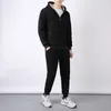 Ensemble décontracté d'automne et d'hiver Sports de sports pour hommes épaisses chaudes plus tâches masculines de la mode masculine pour hommes de la mode.