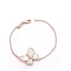 Joyería chapada en oro caliente con mariposa de rodamiento blanco con diamante chapado en cobre collar de oro rosa conjunto de pulsera Bq6La