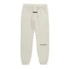 Pantalon de survêtement des hommes FW21 Lettre réfléchissante 100% coton Pantalon Jogging Pantalon Hip Hop Lâche Unisexe Sweat à capuche surprise surdimensionnée