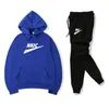 2 stycken uppsättningar märke tracksuit kvinnor män plus storlek 3xl jogging män set sport kostym man bomull hoodie + pants sportkläder pojke