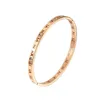 Pulseira de numeral romana com fecho de ouro rosa e anel de diamante F11307999623