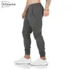 SITEWEIE Hommes Jogger Pantalons Pantalons de survêtement Homme Gymnases Fitness Coton Pantalon Homme Casual Mode Skinny Track Pantalon Zipper Pantalon LJ201104