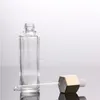 卸売ユニークな六角形のグラスドロッパーボトル香水セラムドロッパーボトル30ml白いプラスチックドロッパーの蓋
