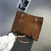 Modische Damen-Umhängetasche mit großem Fassungsvermögen, quadratische Handtasche mit Kette, hochwertige, mit Korbgeflecht verzierte Briefträgertasche
