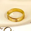 gold band diamond engagement ring