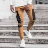 Męskie jesienne zimowe kieszonkowe patchworkowe spodnie do biegania długie spodnie bojówki Streetwear H1223