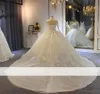 Vestidos de novia de vestidos de pelota Sparkling Sheer Jewel Neck Sleves mangas largas Vestidos de novia Vestidos a medida Abiti Da Sposa