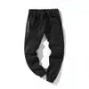 Slim fitness homens calças hip hop harem corredores calças mens corredores sólidos multi-bolso sualpants masculinos cargas casuais calças de fundo 201110