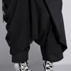 EAM 2020新しいスプリングハイエラスティックウエストブラックフォールド包帯ステッチルースロングクロスパンツ女性ズボンファッションLJ200813