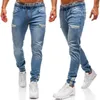 Męskie dżinsy chude mężczyźni chłopak streetwear hip -hop designer dżinsowe spodnie z kieszeniami mody dziura spodni odzież 4xl