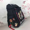 Classic flip embroidery luxurys designers backpacks men large real leather canvas mens backpack ladies bags handbags size 32*45*14cm