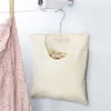 hängende wäscheklammer-tasche