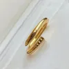 2023 Mujeres Anillos de amor Titanio Acero CZ Diseñador de diamantes Anillo de un solo clavo Moda europea americana Clásico Casual Pareja Oro rosa Plata Regalo de joyería de lujo