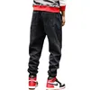 Mäns Jeans Fashion Streetwear Men Spliced ​​Designer Denim Cargo Pants Plus Size 28-44 Hip Hop Joggers Vinter Velvet Varma Långt byxor