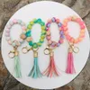 Handmade esticada primavera arco-íris de silicone grânulos pulseira chaveiros pu tassel de couro pulseira pulseira chaveiros para 2022