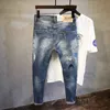 Jeans da uomo alla moda in stile coreano Jeans strappati con toppe ricamate Pantaloni a matita elasticizzati Streetwear Jeans hip-hop elastici da uomo