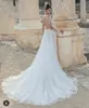 2021 A Line Wedding Dresses Lace Appliqued Sheer Long Sleeve Overskirt Bridal Gowns Open Back Sexy vestido de novia