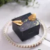 Confezione regalo 50 pezzi Borse per bomboniere creative in oro nero con nastro ad ala Scatole per caramelle dolci Baby Shower Party Packing1