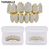 Europa y América Hip Hop Iced Out CZ Gold Teeth Grillz Caps Top Bottom Diamond Teeth Grillzs Set Hombres Mujeres Grills6595307