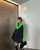ポケット付きの黒いカジュアルドレスロッセ女性シースクラブドレス