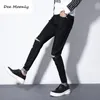 Jeans da uomo DEE MOONLY Saldi Uomo Nero 2021 Moda Grandi vestiti autunnali Pantaloni strappati di marca1