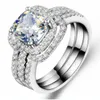 純正銀の結婚指輪18Kホワイトゴールドメッキ完璧な3番目のクッションの婚約バンドNSCDシミュレートされたダイヤモンドの高級リングセット