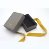 Anpassad kartong Luxury Mini Hardcover Ring Halsband Smycken Papper Presentförpackning med gult silkeband