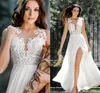 Mariage Sexy New Boho Beach Wedding Dresses 2021 O Neck Cap Sleeve Pearls Applique Chiffon High Slit Bridal Gown