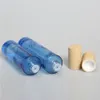 الزرقاء القابلة لإعادة التعبئة زجاجة عطر صغيرة من الزجاج رذاذ 40ML. مضخة محلول 40ML مع غطاء الخشب الأصفر