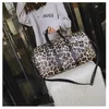 Sacs femme nouvelle mode femme imprimé léopard cylindre sac à main grande capacité sac à maina voyage Pu femme sac