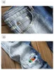 Adam Yama Delik Kot Moda Trend Sokak MID Bel Düz Denim Pantolon Tasarımcı Erkek Sonbahar Yeni Fermuar Esneklik Rahat Kot