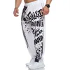 Höst Nya Gym Sportbyxor Casual Loose Andningsbar Hip Hop Fashion Letter Trend Joggers Fitness Bodybuilding Brand Sweat Byxor G0104