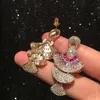 Wiosna Nowy Zaprojektowany Dangle Mikro wkłady Pełne diamenty błyszczące wentylator Fringe Tassels Ear Studs Kobieta Moda Kolczyki Luksusowa Biżuteria Biżuteria