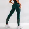 Haimaitong höga midja fitness leggings kvinnor sexiga sömlösa leggings ihåliga tryckta träningsbyxor tryck upp smal elasticitet y0327