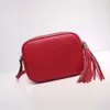 bolso de cartera de flecos