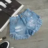 Yaz Moda Kadınlar Denim Şort Beyaz Delik Seksi Yırtık Kot Şort Kadın Streetwear Püskül Yüksek Bel Şort Feminino C4230 T200701