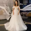 Tule a line bruidsjurken romantische kant applicaties uit de schouder Sexy Empire Taille Sweep Train Bridal Jurken Arabische Aso Ebi Boho Garden Vestidos de Novia