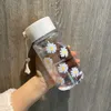 Neue kleine Daisy transparente Kunststoff-Wasserflaschen 500 ml kreative gefrostete Wasserflasche mit tragbarem Seil Reise-Teetasse HH9-3680