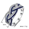 Nouveau produit tout nouveau bijoux uniques Sterling Sier Double couleur bleu saphir blanc Cz éternité femmes mariage croix bande anneau cadeau