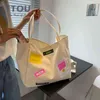 Торговые сумки большой емкости этикетки дизайн холст плечо для женщин новый летний милый колледж Tote Graffiti цветная сумка 220310