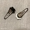 Pinces à cheveux en acrylique noir et blanc à la mode, barrettes à clip en un mot, accessoires de tête populaires dans les pays européens et américains237F