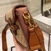 1955 أكياس السرج حقيبة كتف أزياء النساء CrossBody حقيبة يد جودة luxurys كبار المصممين مخلب سيدة محفظة حقائب يد معدنية جلد طبيعي أبازيم طباعة