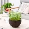 OOTDTY Beautiful Round Plastic Flower Pot Garden Plant Chain Woven Wicker Hanging Planters Balcony Decoration Y200723