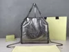 Se penchant sur toutes les tailles de petites poignées de main sacs de créateurs célèbres noms de marques féminines stella mcartney falabella bags1955