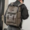 Estilo de couro Estudante Travel Mochila de Alta Qualidade Homens Mulheres Rivet Mochila Famosas Bolsa Meninas Meninos Meninos Moda Escola Sacos