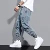 Hombres Moda High Street Jeans Casual Harem Pantalones con estampado de letras Pantalones de chándal azul claro Pantalones con cordón Homens Jeans Denim Pants291J