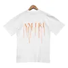 T-shirt amiirs estive 2024 s T-shirt a maniche corte per uomo e donna di marca Sand Fluid Letter stampata 525W